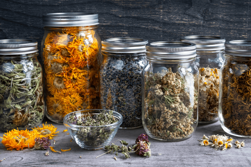 Assorted dried herbs in jars