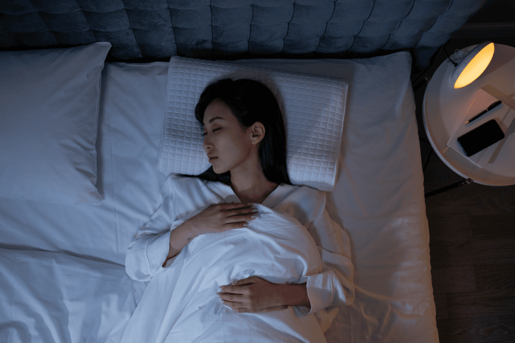 woman sleeping in bed