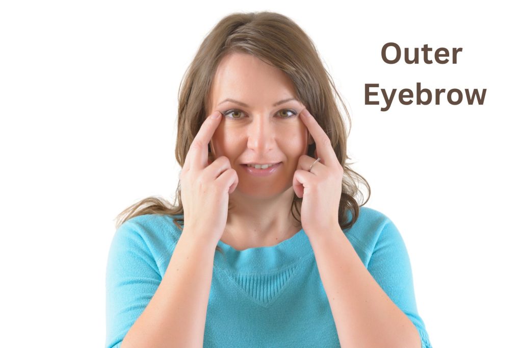 outer eyebrow tapping point